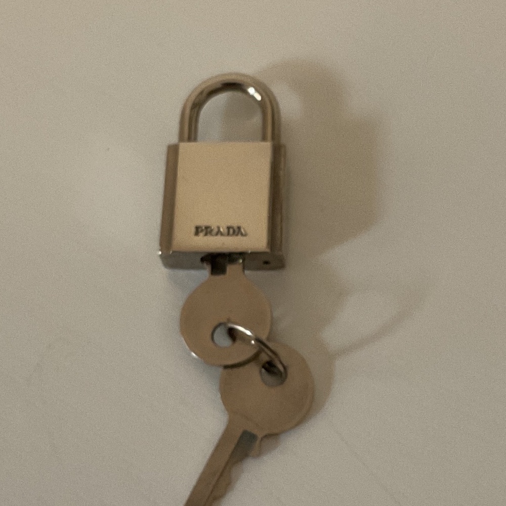 Prada silver Tone Lock n key EUC